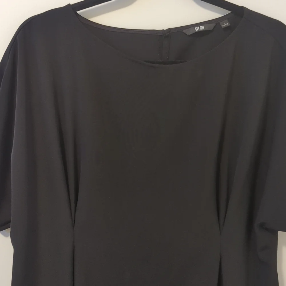 Uniqlo Black Peplum Top - Picture 2 of 6